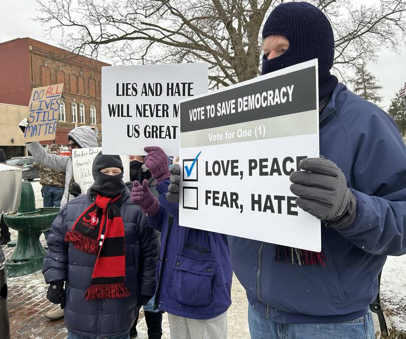 Approximately 120 people attended Indivisible of Ogle County's protest on Sunday, Jan. 25, 2026 in downtown Oregon. Attendees carried signs criticizing the Trump administration's deployment of ICE officers and the shooting death of Alex Pretti by ICE agents on Saturday in Minneapolis.