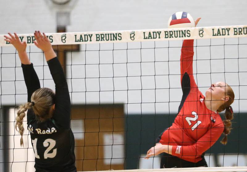 Henry-Senachwine's Brynna Anderson sends a kill past St. Bede's Sadie Koehler during the Class 1A Regional final game on Thursday, Oct. 31, 2024 at St. Bede Academy.