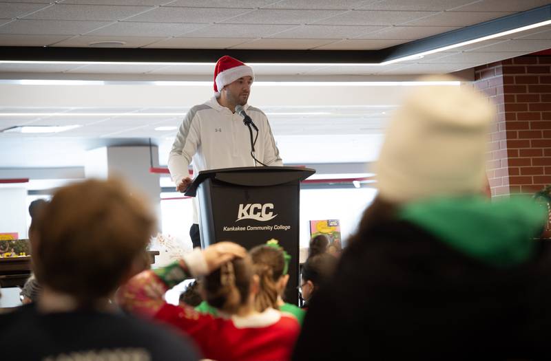 Dr. Austin Chinn, with OAK Orthopedics, makes a few comments after the race in the 35th annual Jingle Bell Run at Kankakee Community College on Sunday, December 7, 2025.