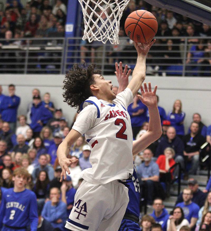 Marmion Academy’s Jabe Haith corrals the ball in IHSA Class 3A Sectional title game action at Burlington Central High School Friday night.