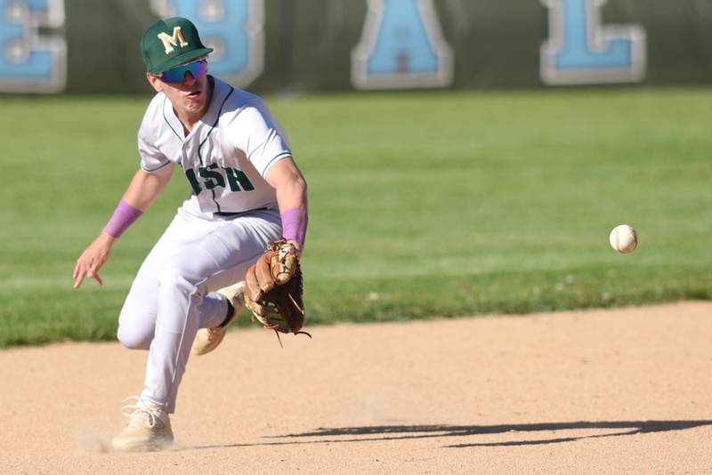 Bishop McNamara's Taylor Fuerst fields a ground ball during a game at Kankakee Friday, May 9, 2025.