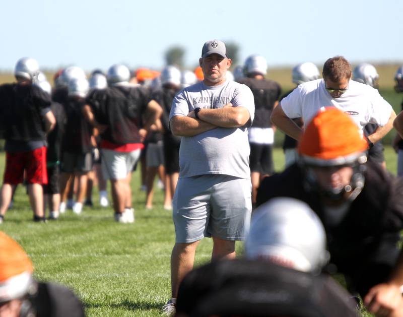 Kaneland High School Head Coach Patrick Ryan looks on during practice in Maple Park on Wednesday, Aug. 10, 2022.
