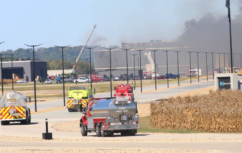 Fire trucks from Amboy, Franklin Grove, Paw Paw and Sublette respond to a structure fire on Wednesday, Oct. 8, 2025 at Marquis Energy in Hennepin. The fire was upgraded to a 5th alarm dispatching the (MABAS) Mutual Aid Box Alarm System. The fire broke out around 11a.m.