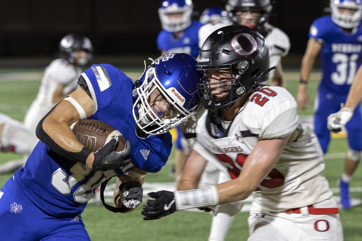 Newman’s Brady Williamson blasts through Orion’s Aaron Mohr for a touchdown Friday, Sept. 20, 2024, at Roscoe Eades Stadium in Sterling.
