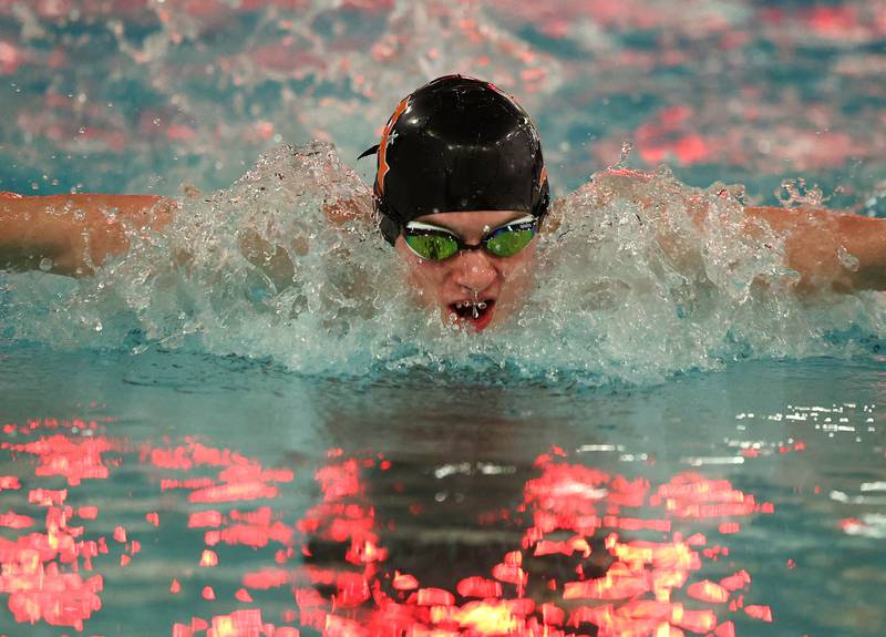 DeKalb-Sycamore co-op swimmer Luke Oland competes in the varsity 100 yard butterfly Thursday, Jan. 23, 2025, during their meet against Metea Valley at the Huntley Middle School Pool in DeKalb.