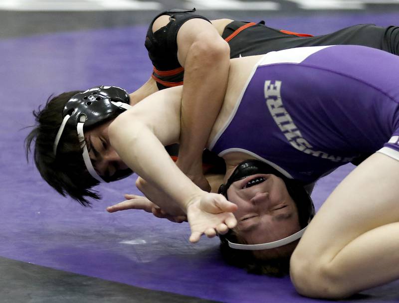 Huntley's Alex Gutierrez controls Hampshire's David Beckerduring the 132-pound match of a Fox Valley Conference wrestling meet on Wednesday, Jan. 8, 2025, at Hampshire High School.