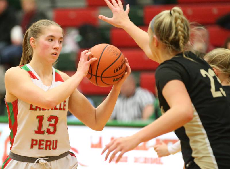 L-P's Olivia Shetterly passes the ball around Sycamore's Evyn Carrier on Tuesday, Jan. 31, 2023 at L-P High School.