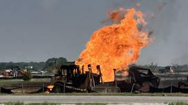 Ruptured gas line fuels construction equipment fire in Oswego