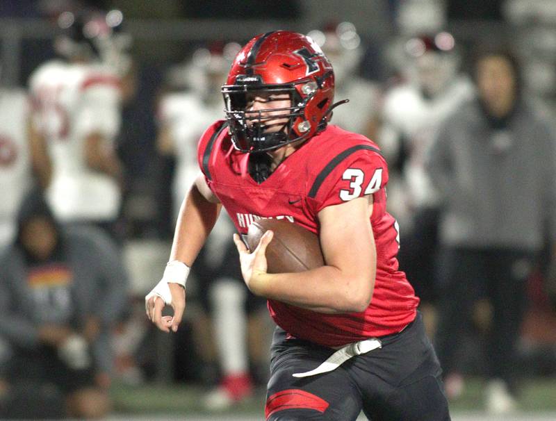 Huntley’s Haiden Janke runs the ball against Niles West in first-round Class 8A playoff football action at Huntley Friday.
