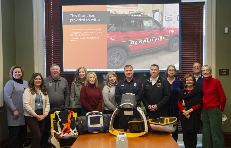Representatives from the DeKalb Fire Department, Elder Care Services, and the DeKalb County Community Foundation gather in mid-December 2025 to highlight the Community Paramedicine Program grant, which supported the purchase of a new response vehicle and related equipment.
