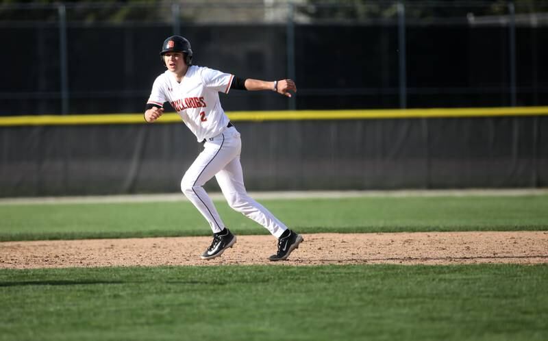 Batavia’s Jacob Aseltine runs between second and third base during a home game against Geneva on Monday, April 29, 2024.
