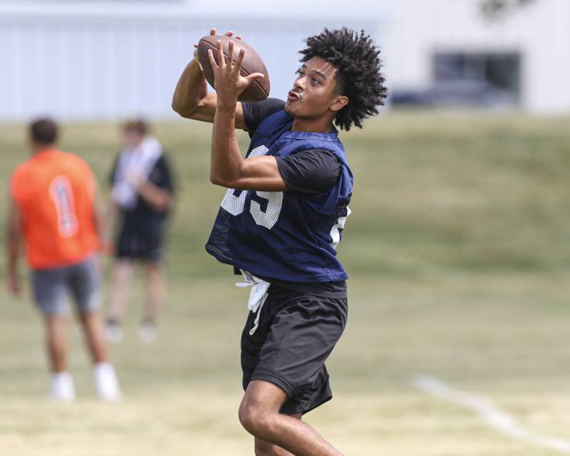 Dontrell Young goes up for a catch at Oswego High School Football Practice, Monday, Aug 11, 2025  in Oswego.