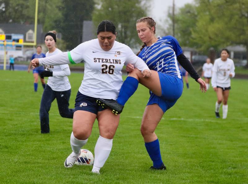 Sterling's Michelle Diaz battles Princeton's Ava Kyle Thursday at Bryant Field. The Tigresses won 3-1.