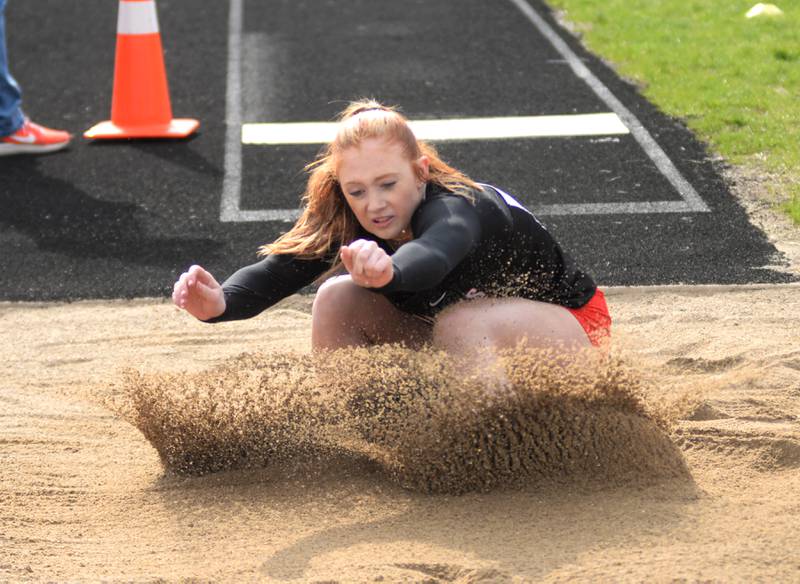 Fulton's Paige Cramer lands in the sand during the long jump competition at the Landers-Loomis Invitational track meet on Friday, April 25, 2025 held at Oregon High School.