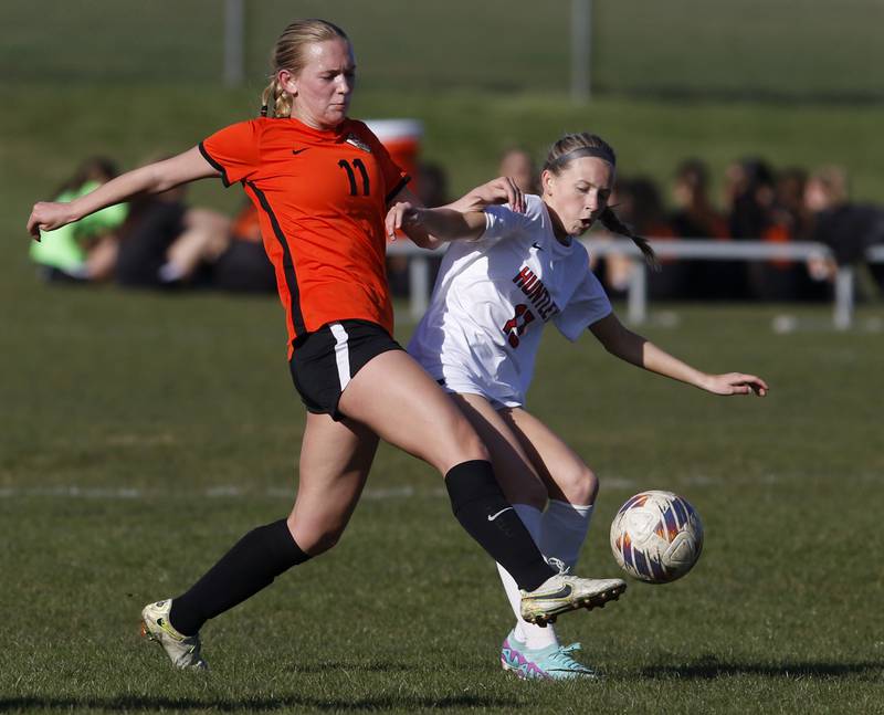 Crystal Lake Central's Maddie Gray battles with Huntley's Itzel Martinez for control of the ball during a Fox Valley Conference soccer game on Tuesday, April 9, 2024, at Crystal Lake Central High School.