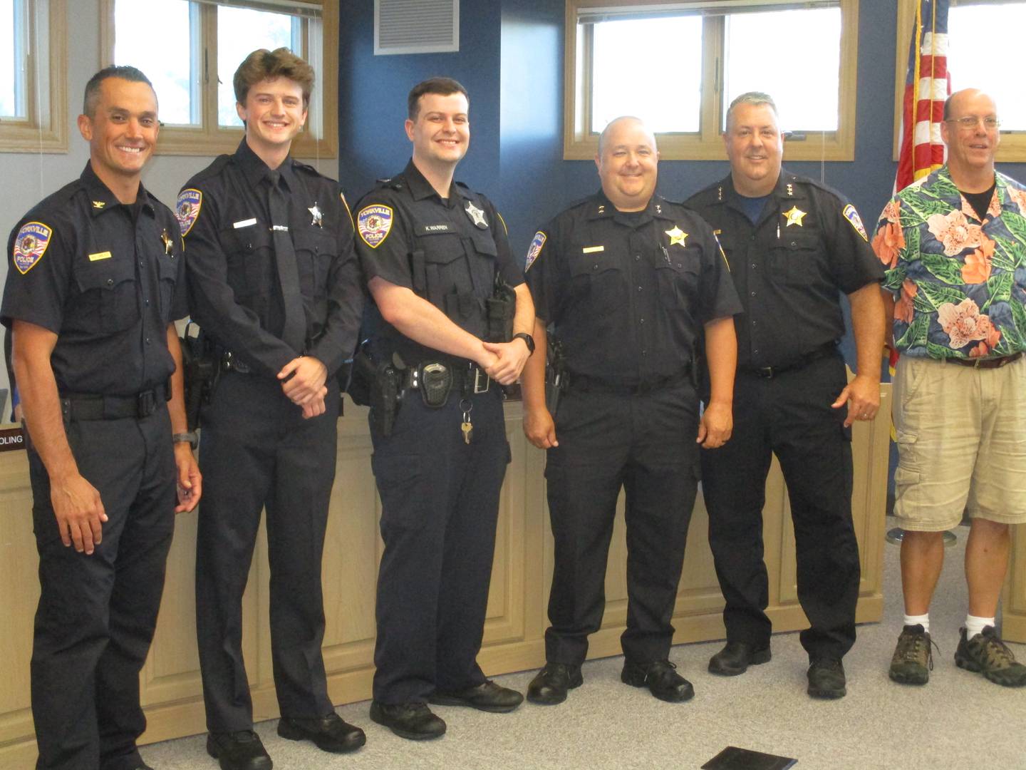 Yorkville welcomed to two police officers at the Aug. 9, 2022 Yorkville City Council meeting. From left is Commander Garrett Carlyle, new officers Peyton Heiser and Kevin Warren, Deputy Chief Ray Mikolasek, Chief Jim Jensen and Mayor John Purcell. (Mark Foster -- mfoster@shawmedia.com)