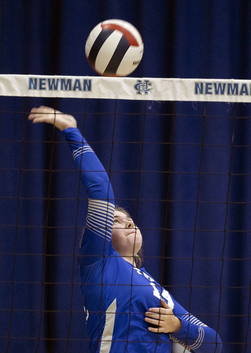 Newman’s Olivia Mulderink makes a play on a ball against Hall Tuesday, Oct. 21, 2025.