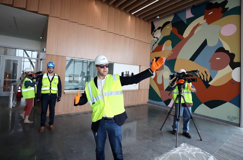 Matt Sexton, community development manager at Meta, gives a tour of one of the buildings under construction Wednesday, April 27, 2022, at the Meta DeKalb Data Center .