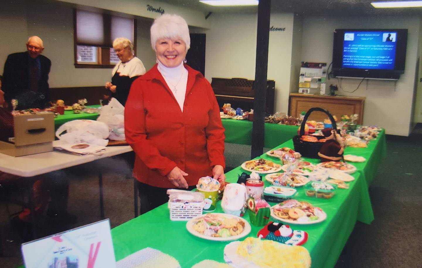 Paula Forester of Mokena lived her faith in words and deeds. She is shown volunteering at a bake sale in 2013 at St. John's United Church of Christ in Mokena.