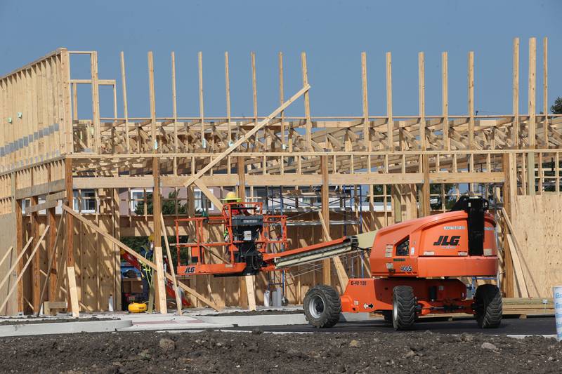 Crews begin on erecting the walls of the new Popeye's location next to Super 8 on Monday, Aug. 2024 in Peru.