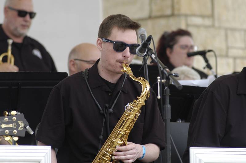 The Yorkville Big Band's Saxaphone player plays to the crowd. The  Bellson Music fest was held on Saturday, June 7, 2025 at RB&W District Amphitheater in Rock Falls.