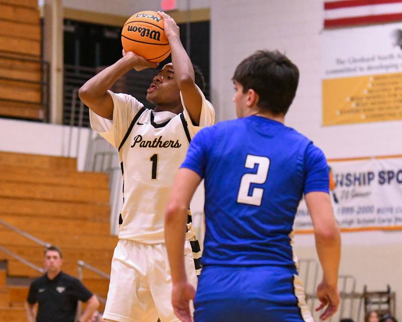 Glenbard North's Lamari Carpenter (1) makes a basket during the game on Tuesday Jan. 6, 2025; while taking on Geneva held at Glenbard North High School.