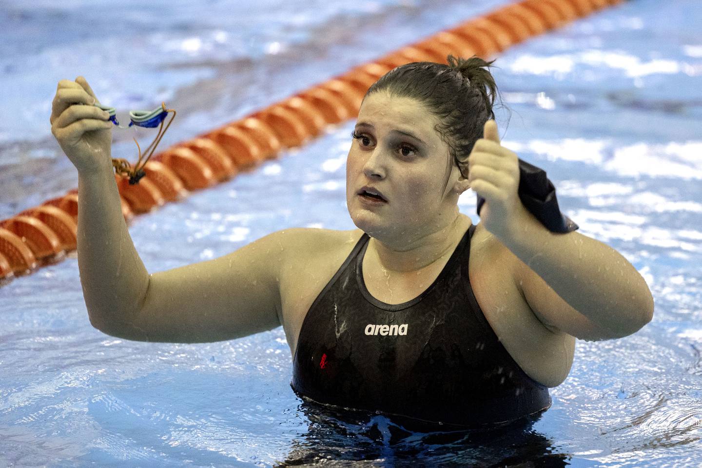 Byron’s Emily Marshall finishes her 100 yard Freestyle Saturday, Nov. 5, 2022 at swimming sectionals in Byron.