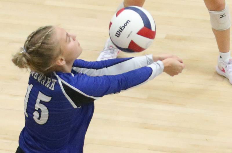 Newark's Myah Wolf returns a serve from Marquette on Wednesday, Aug. 27, 2025 in Bader Gymnasium.