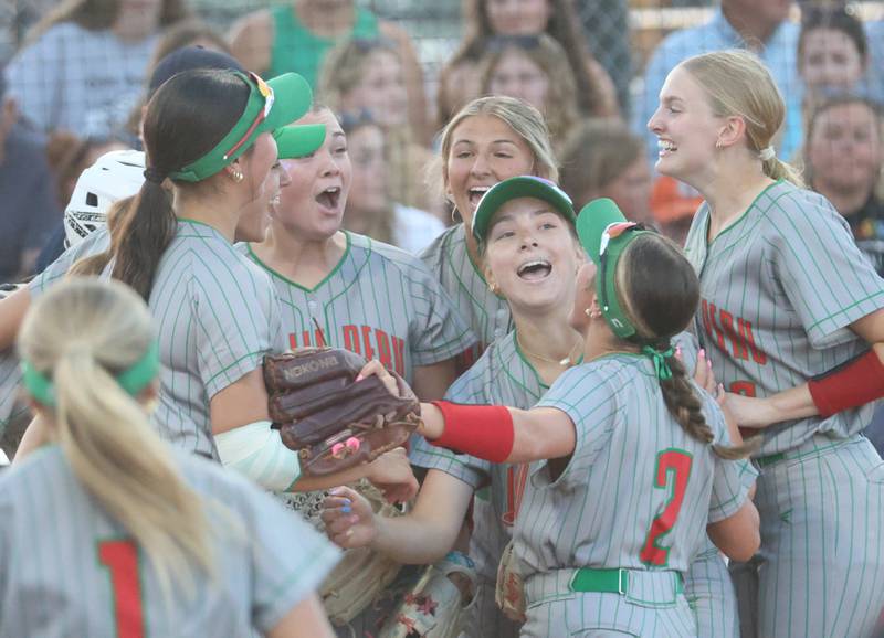 Members of the L-P softball team gather around home plate to celebrate their 2-0 win over East Peoria during the Class 3A Sectional semifinal game on Tuesday, May 26, 2026 at the L-P Athletic Complex in La Salle.