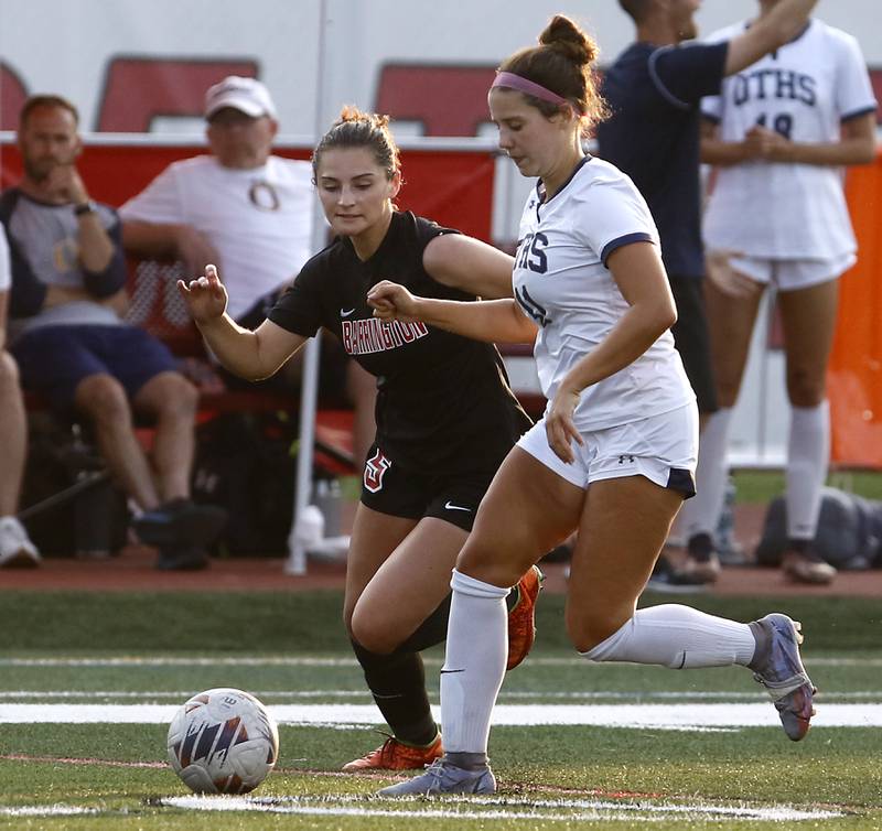 Barrington's Piper Lucier tries to beat O'Fallon's Ella Peterson to the ball during the IHSA Class 3A state championship match at North Central College in Naperville on Saturday, June 3, 2023.