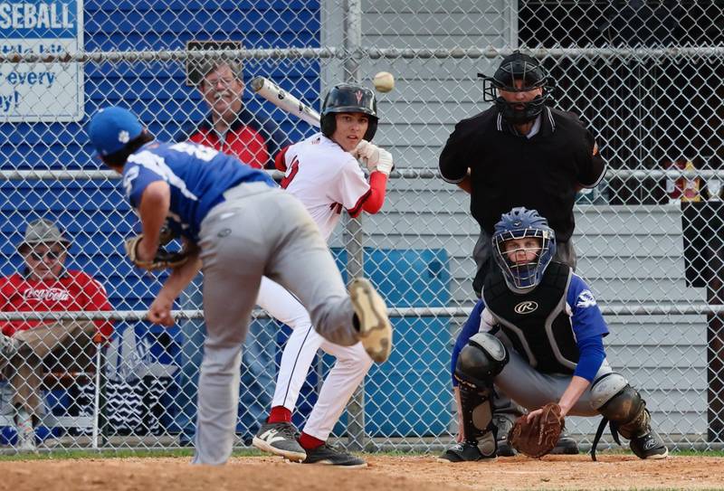 Hall's Noah Plym watches a pitch frim Princeton's Ace Christiansen in the seventh inning Monday at. Prather Field. Hall won 10-4.