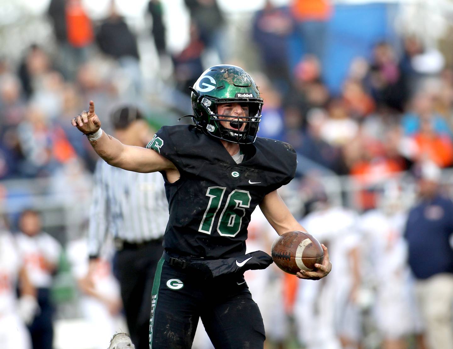 Glenbard West's Jacob Lachs celebrates a turnover during a Class 8A playoffs first-round game against Oswego in Glen Ellyn on Saturday, Oct. 30, 2021.