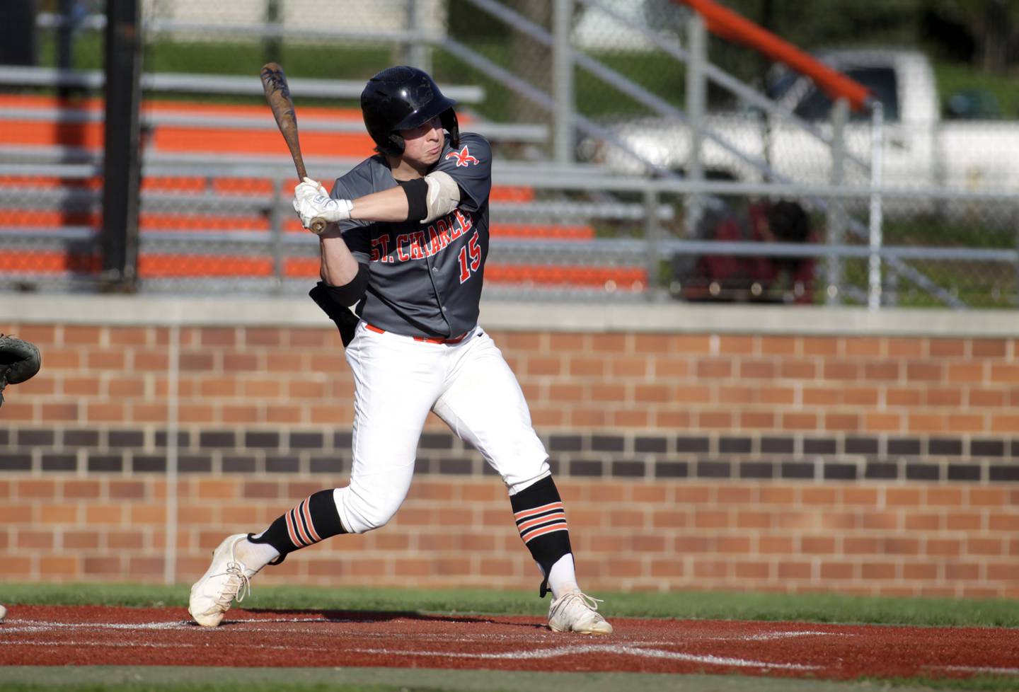 St. Charles East’s Seth Winkler bats during a home game against Geneva on Friday, April 28, 2023. East won 7-6.