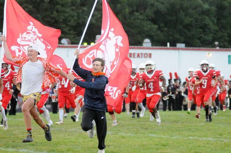 Streator runs onto the field on Friday, Aug. 29, 2025 at Doug Dieken Stadium in Streator.