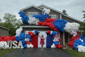Lake in the Hills home festooned with balloons for the Fourth