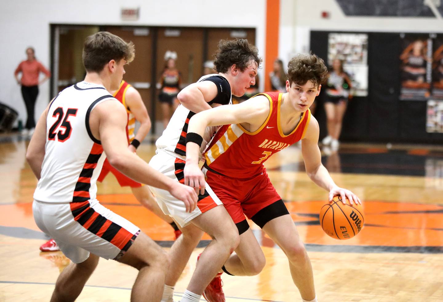 Batavia's Jax Abalos drives toward the basket during a game against Wheaton Warrenville South on Friday, Feb. 14, 2025 in Wheaton.