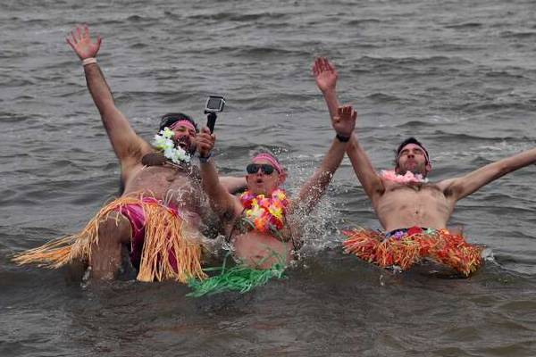 (Almost) freezing for a reason: More than 150 take the polar plunge in Fox Lake