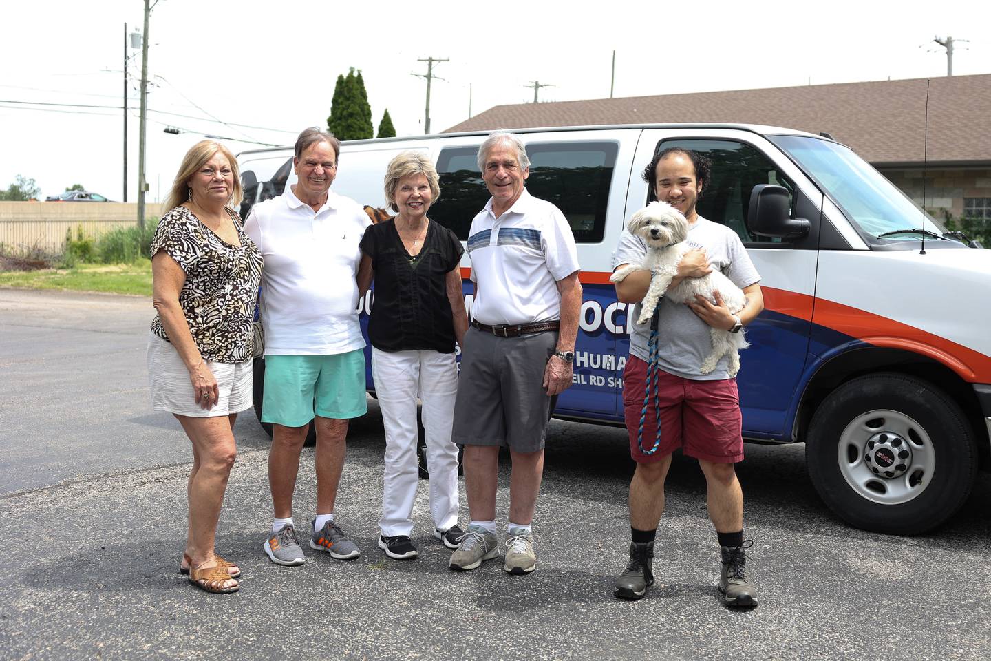 Janet Osmus, left to right, Jim Moody, Will County Humane Society Treasurer Jackie McTee, Tom Osmus and Will County Humane Society manager Garrett Dobson along with Lagos pose for a photo on Tuesday June 4, 2024 in Shorewood.