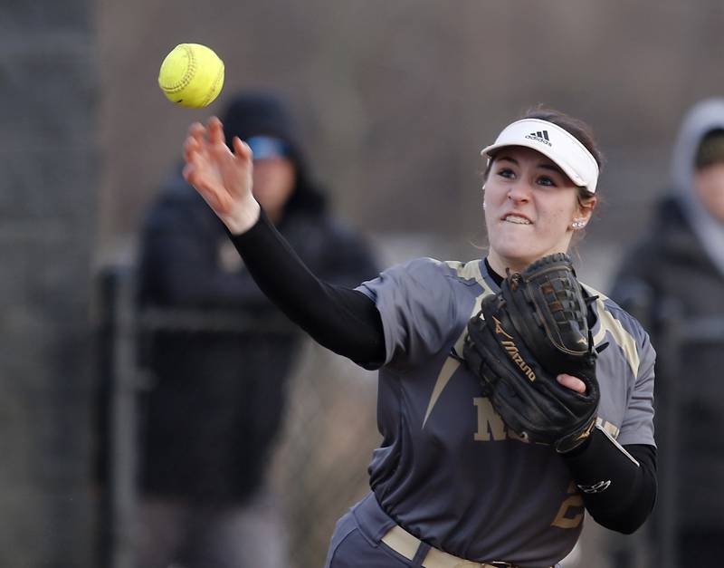 Grayslake North’s Julia Landmesser throws the ball to first base during a nonconference softball game against Prairie Ridge Thursday. March 23, 2023, at Grayslake North High School.
