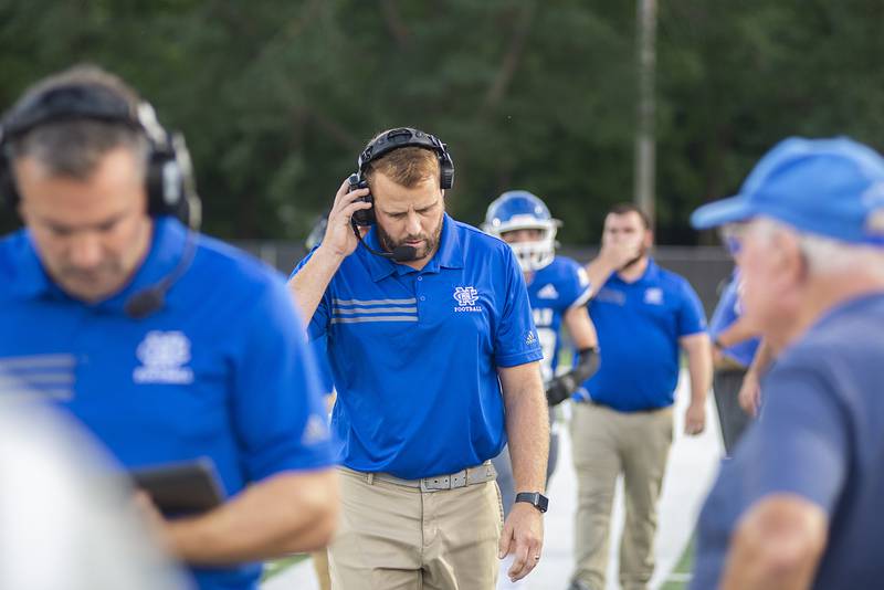 Newman coach Mike LeMay works the sidelines Friday, Sept. 2, 2022 against Rockridge.