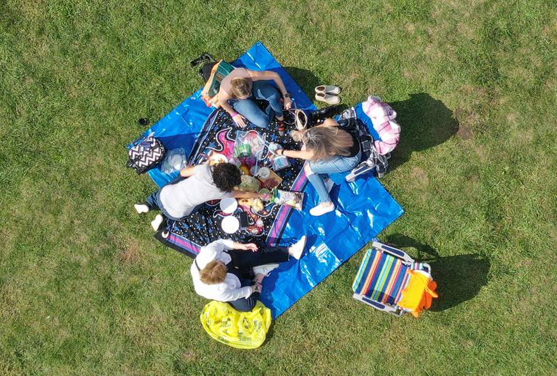 An aerial view of people having a picnic and drinking wine at the 20th annual Vintage Illinois Wine Festival on Sunday, Sept. 17, 2023 in Utica.