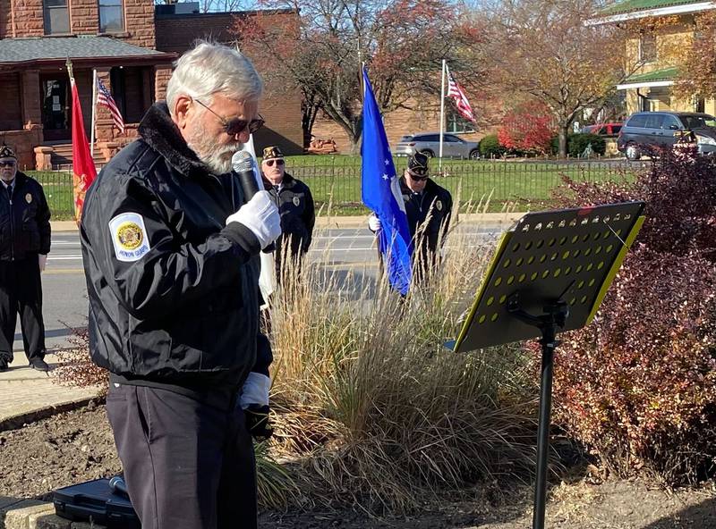 DeKalb American Legion Post No. 66 Chaplain and U.S. Air Force veteran Michael Giuliano, led the crowd in a prayer during an annual Veterans Day ceremony Saturday, Nov. 11, 2023 in downtown DeKalb. The event was hosted by the DeKalb American Legion Post No. 66.