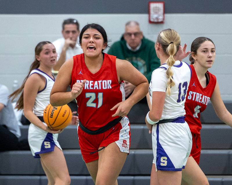 Alexis Thomas (21) of Streator celebrates after scoring layup on Monday, November 17, 2025 at Seneca High School in Seneca.
