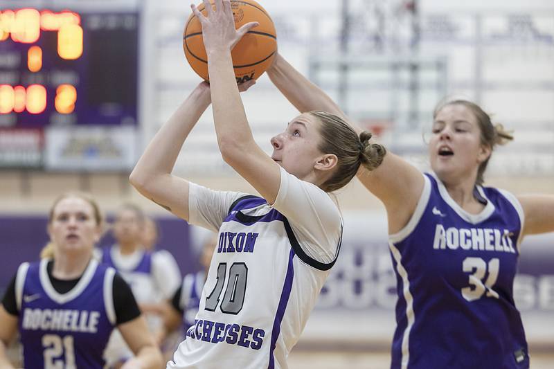 Dixon's Addy Lohse has a shot blocked by Rochelle’s Kendyl Darby Thursday, Dec. 26, 2024, during the Dixon Girl’s KSB Holiday Basketball Tournament.