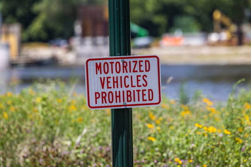 A sign banning motorized vehicles is seen along the multi-use path Tuesday, June 17, 2025, in Dixon.