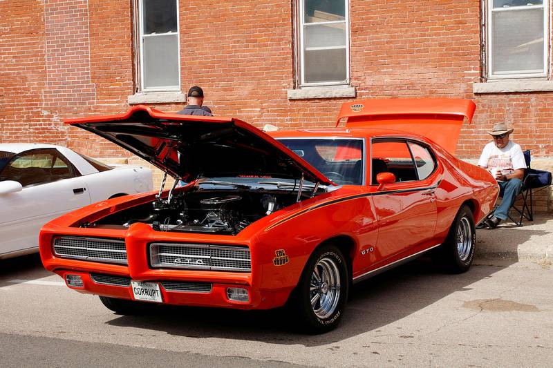 Tom Venhuizen made the short drive over from Morrison to the Erie triangle on Saturday to participate in the Erie Car Show in his beautiful orange 1969 GTO.