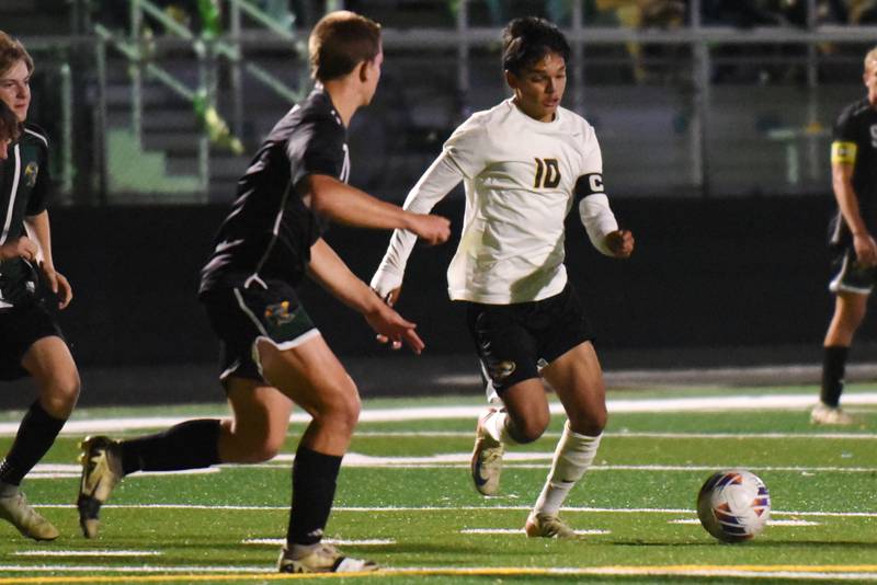 Herscher's Luis Parra, right, looks to dribble past Coal City's Aidan Kenney during a game at Coal City Thursday, Oct., 2, 2025.