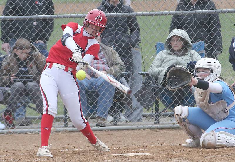 Streator's Mya Zavada makes contact with the ball against Ottawa on Thursday, March 27, 2025 at Ottawa High School.