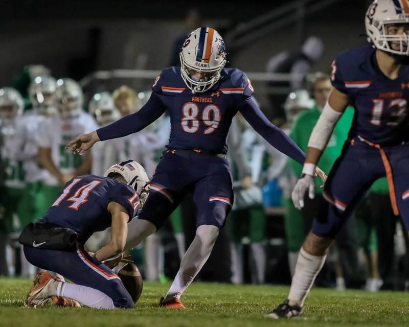 Oswego's Kaleb Stumpenhorst kicks an early field goal during Class 8A second- round football game between York at Oswego on Friday, Nov 8, 2024  in Oswego.