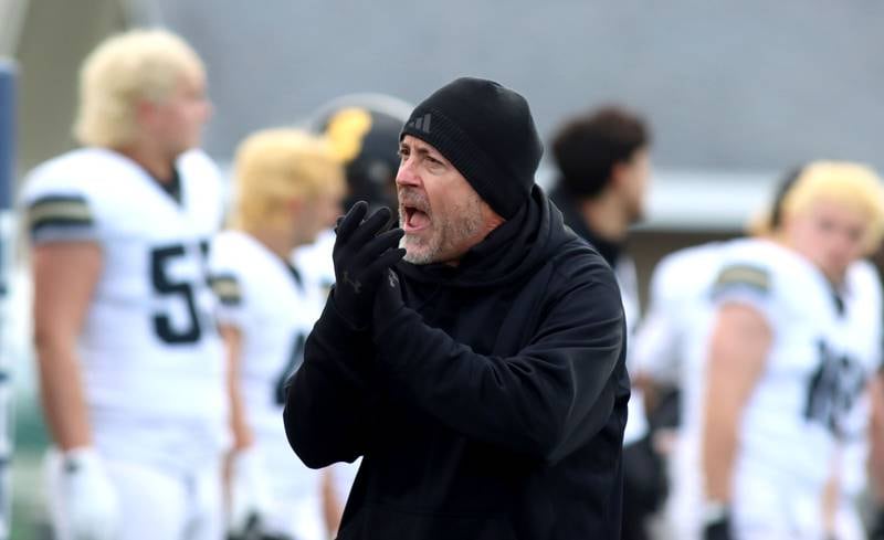 Sycamore’s Head Coach Joe Ryan leads the Spartans in IHSA football Class 5A first-round playoff action at Al Bohrer Field on the campus of Cary-Grove High School in Cary on Saturday, November 1, 2025.